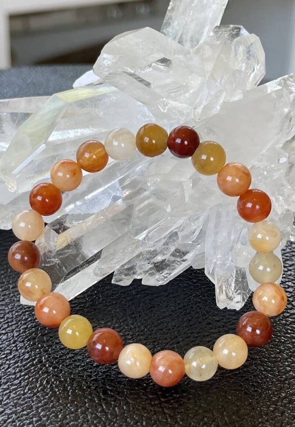 Oranje Imperial Jade armband met ronde kralen en elastiek 8,5mm