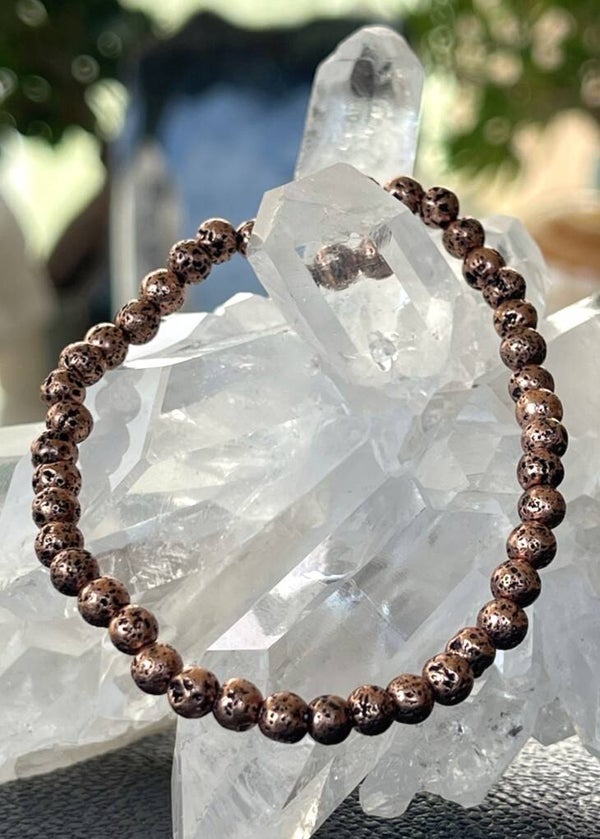 Koper armband met ronde kralen en elastiek 4,9mm