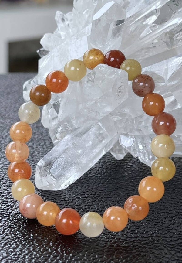 Oranje Imperial Jade armband met ronde kralen en elastiek 8,6mm