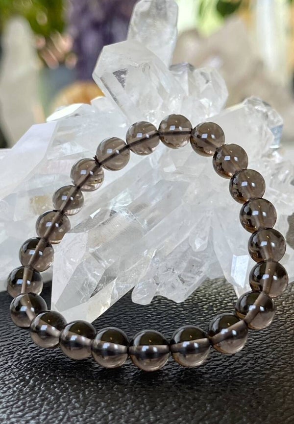 Rookkwarts armband met ronde kralen en elastiek 8,5mm