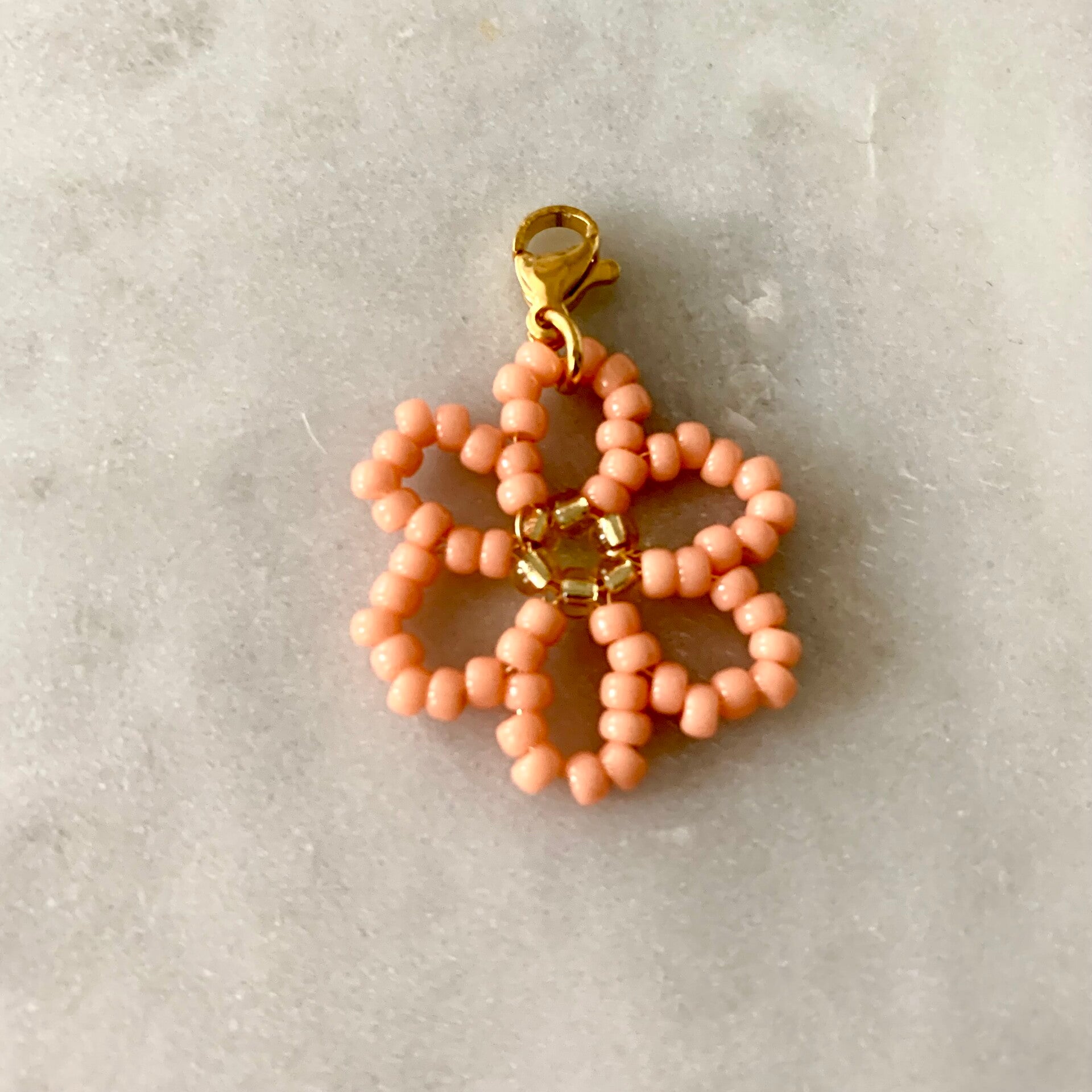 Bloem bedel | pastel oranje