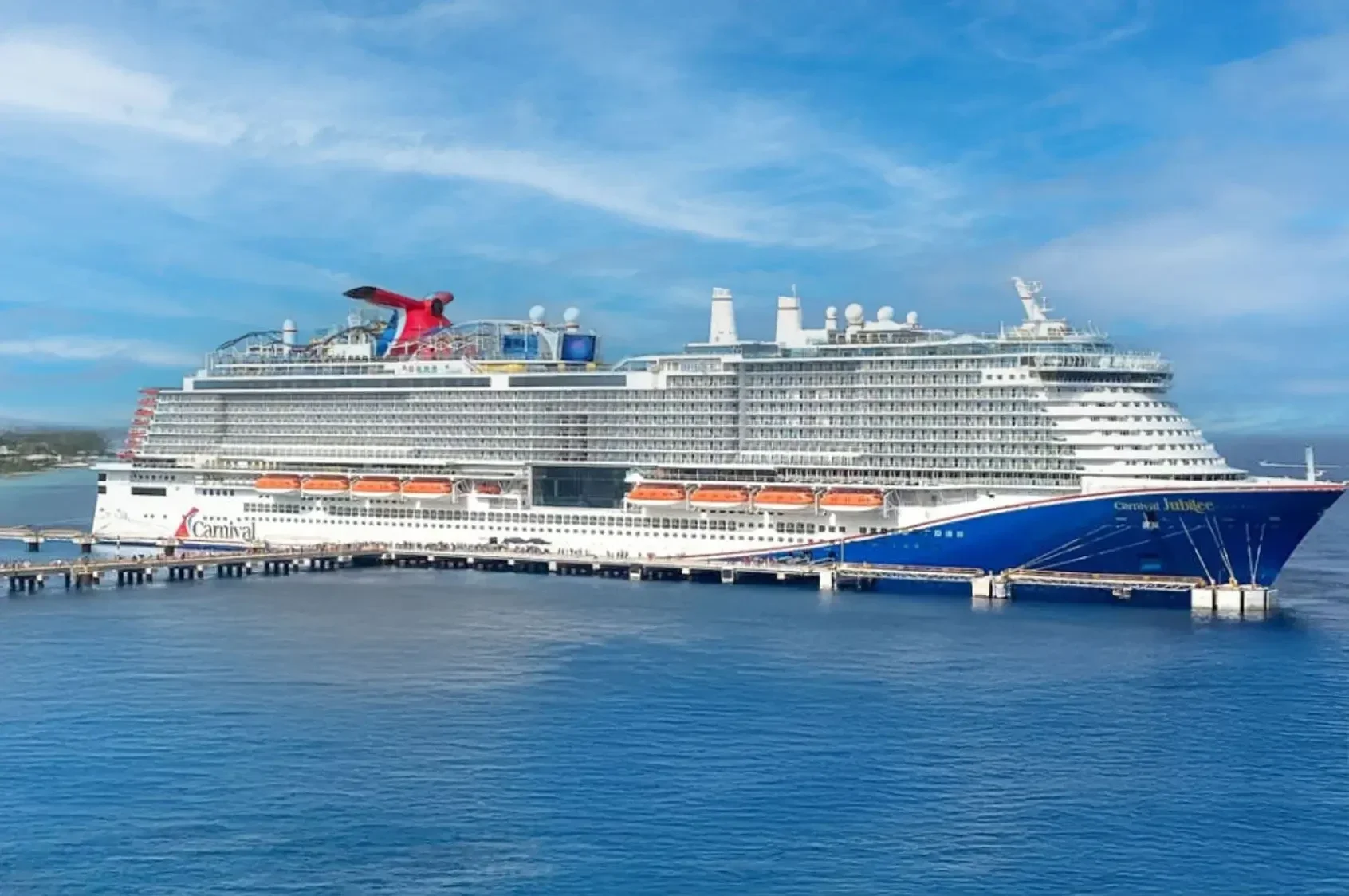 Carnival cruise ship casino with tables and slots ready for evening play