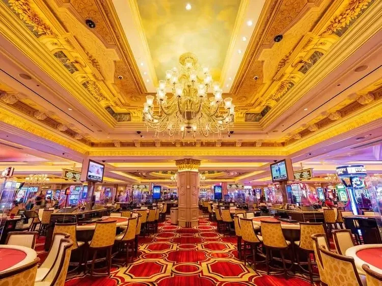 Casino gaming floor representing casino comps, rewards and player loyalty programs
