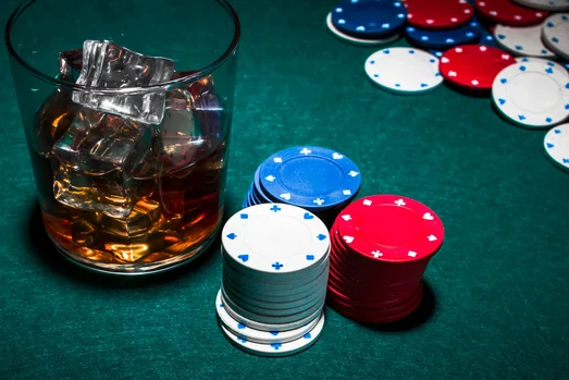 Casino host reviewing a player’s ADT and theo to approve room, dining, and resort-fee comps