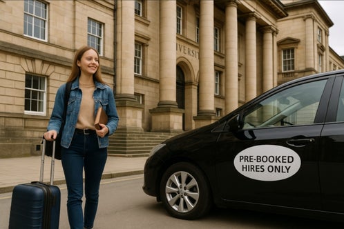Student with suitcase outside university steps into black private hire taxi with “PRE-BOOKED HIRES ONLY” sticker on the front door.