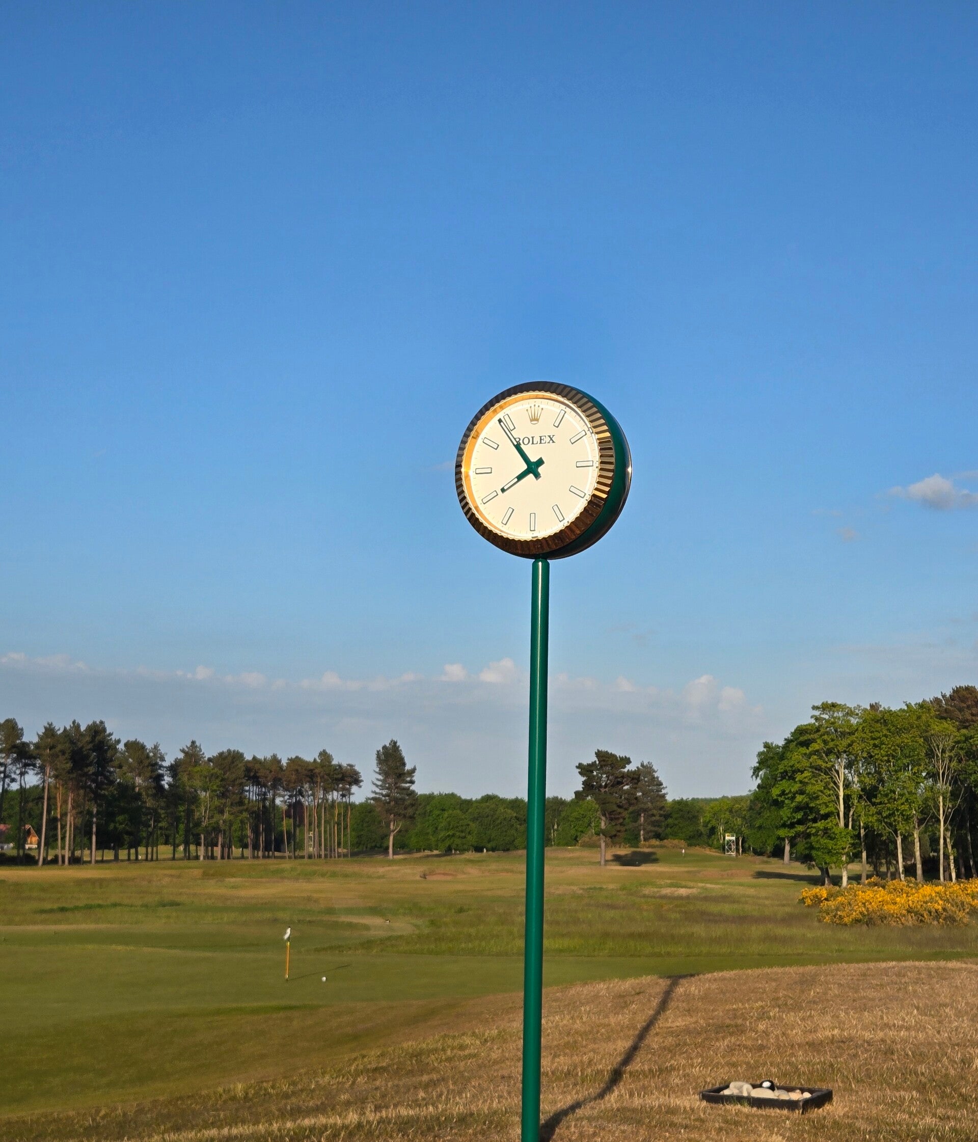 Scottish Open golf course with Rolex tournament clock and fairway in East Lothian