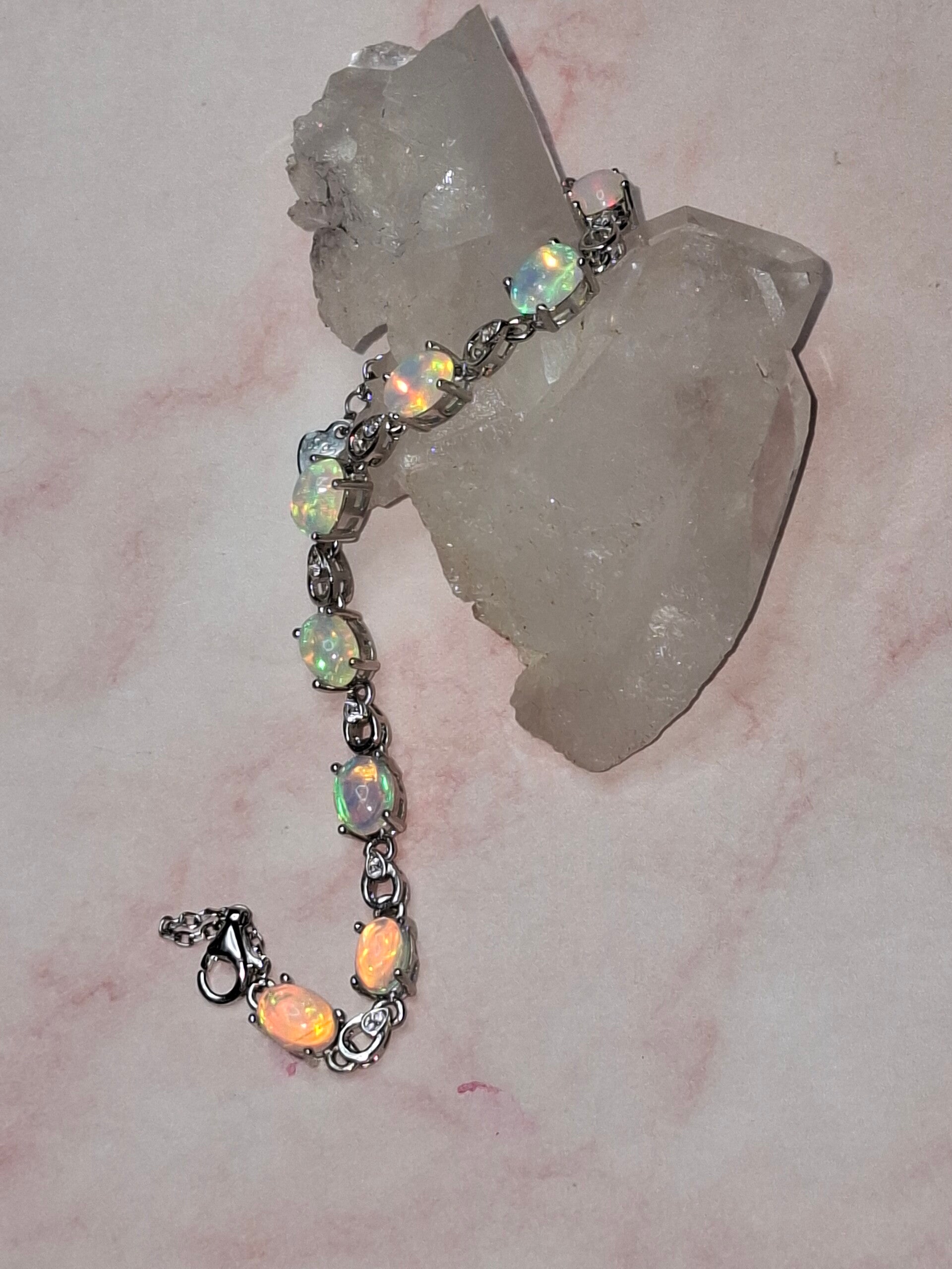 Bracelet argent s925 rodhié 8 opales welo parme 7x5mm naturelles