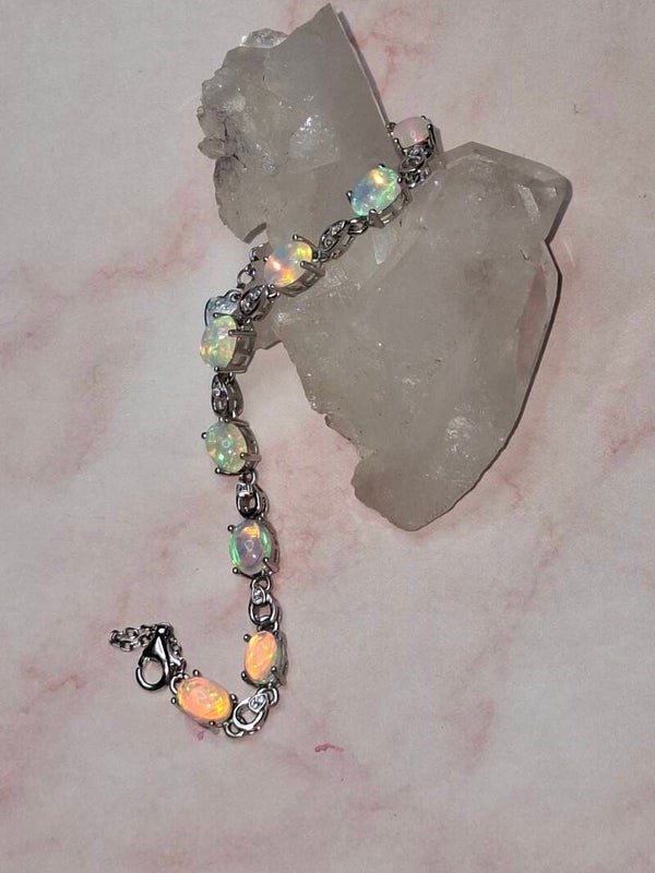 Bracelet argent s925 rodhié 8 opales welo parme 7x5mm naturelles