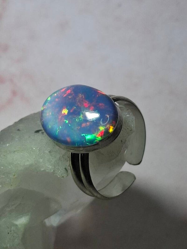 Bague argent massif 925 et opale véritable Éthiopienne. Pierre de 16x12mm welo arc en ciel