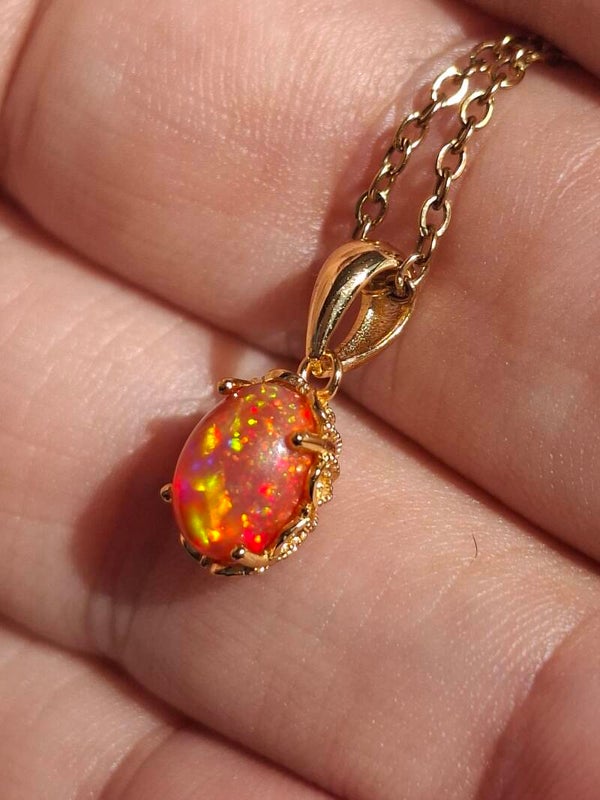 Pendentif argent plaqué or s925 et opale rouge orangé pailleté galaxie