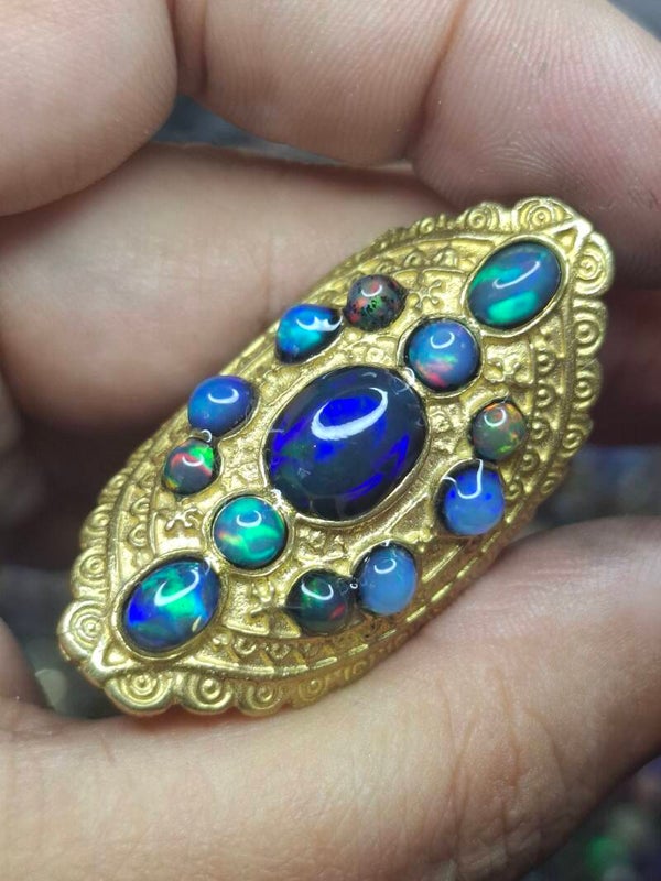Bague orientale ajustable avec 13 opales éthiopiennes