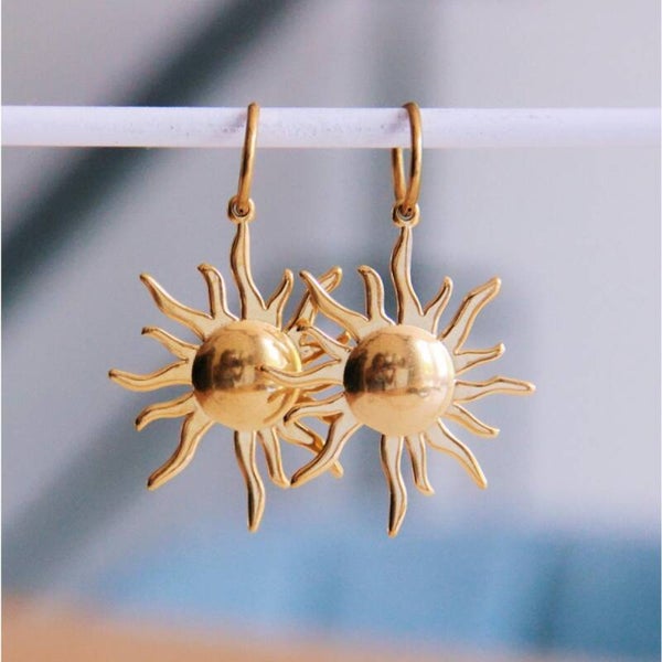 Créole en acier inoxydable avec pendentif solaire