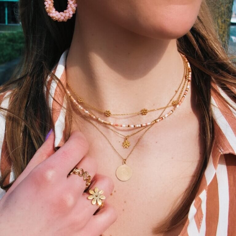 Collier fin fleur marguerite acier inoxydable - doré