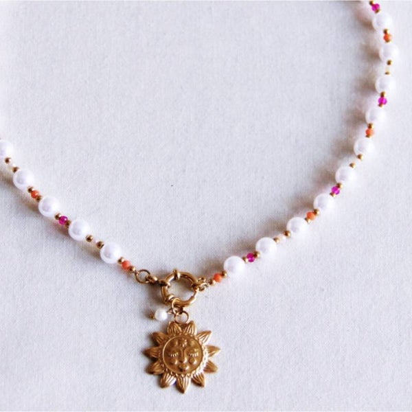 Collier de perles facettées avec breloque soleil - rose/orange