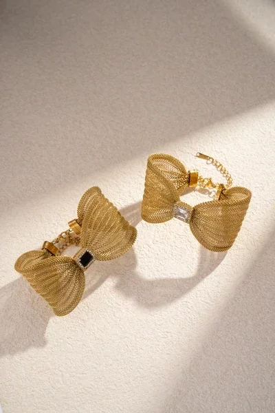 Bracelets manchette dorés en maille avec nœud bijou central
