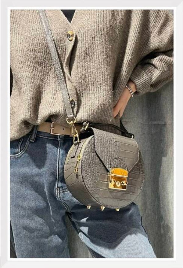 Sac à bandoulière forme rond en cuir effet croco