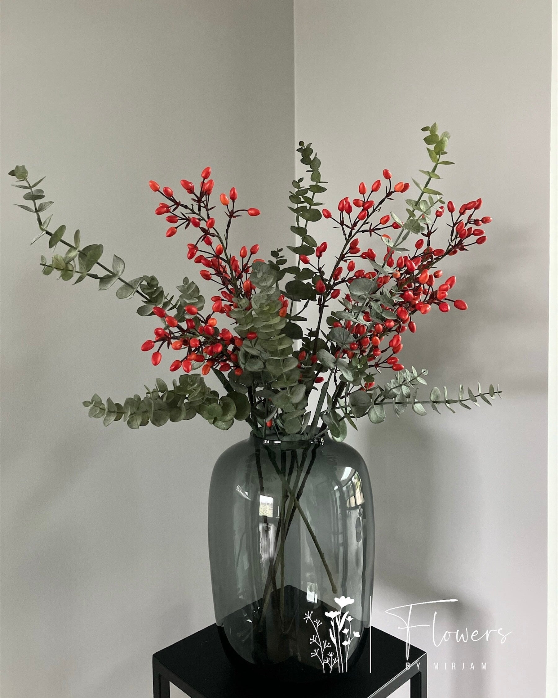 Boeket eucalyptus met oranje besjes