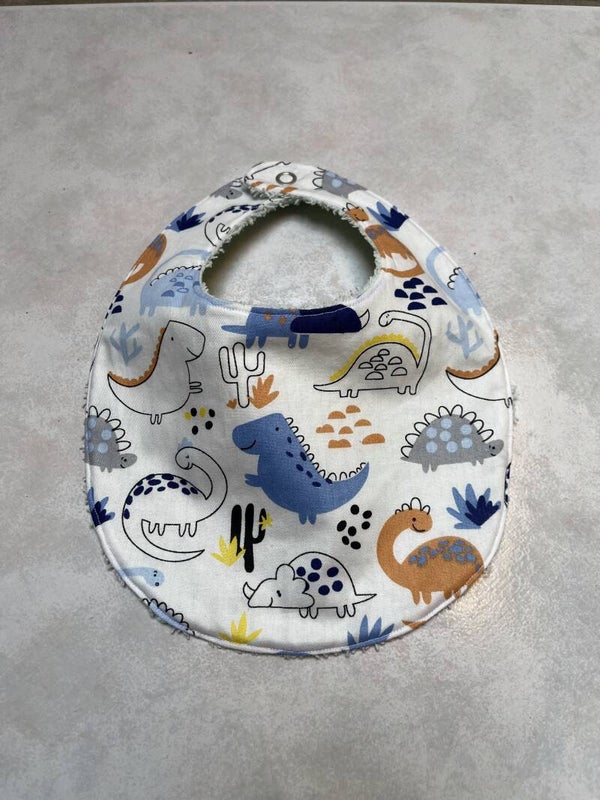 bavoir à pression dinosaures