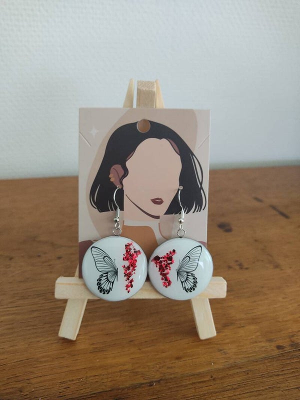 Boucle d' oreille papillon