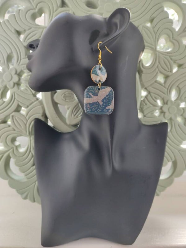 Boucle d' oreille Poème