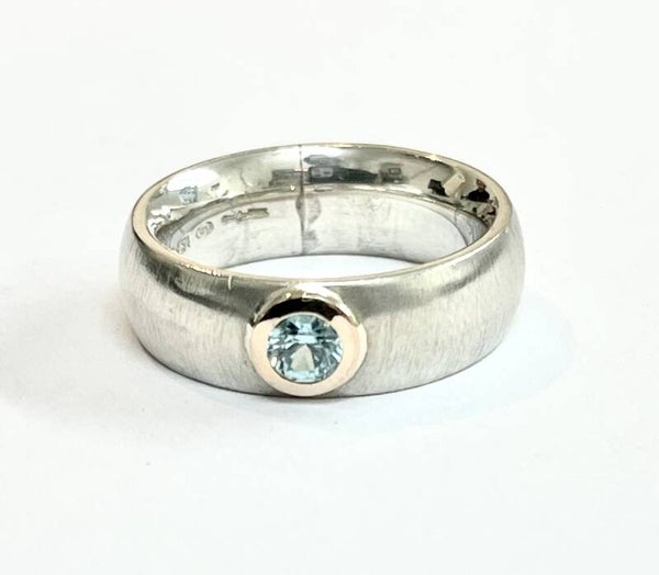 Zilver met Roségouden ring bezet met Blue Topaz