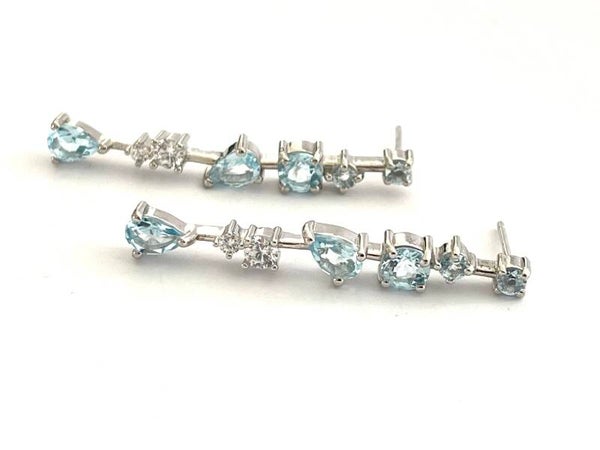 Zilveren oorbellen met Sky Blue Topaz en Zirconia
