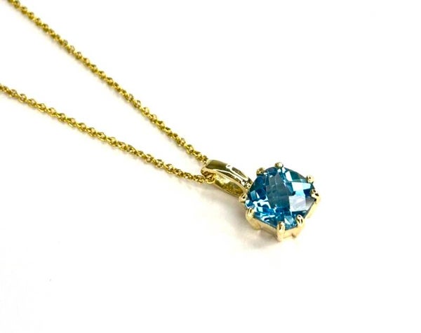 Huggs Hanger Geelgoud met Swiss Blue Topaz