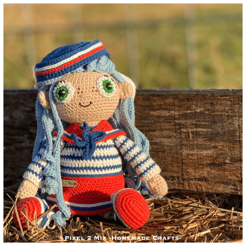 Enter the cozy world of crochet creations with Mary - The Sailor Girl, the perfect addition to your next crochet project! With the crochet pattern from Pixel 2 Mix, you can bring this charming sailor girl to life on your own. Detailed instructions make cr