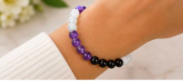 Elegant Beaded Bracelet in Purple, White, and Black