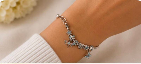 Silver Charm Bracelet with Blue Accents