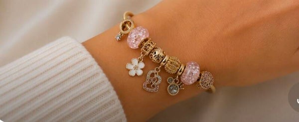 Gold Charm Bracelet with Pink Crystal Beads