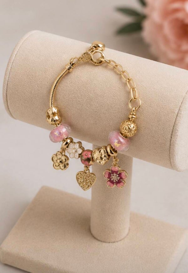 Gold and Pink Charm Bracelet