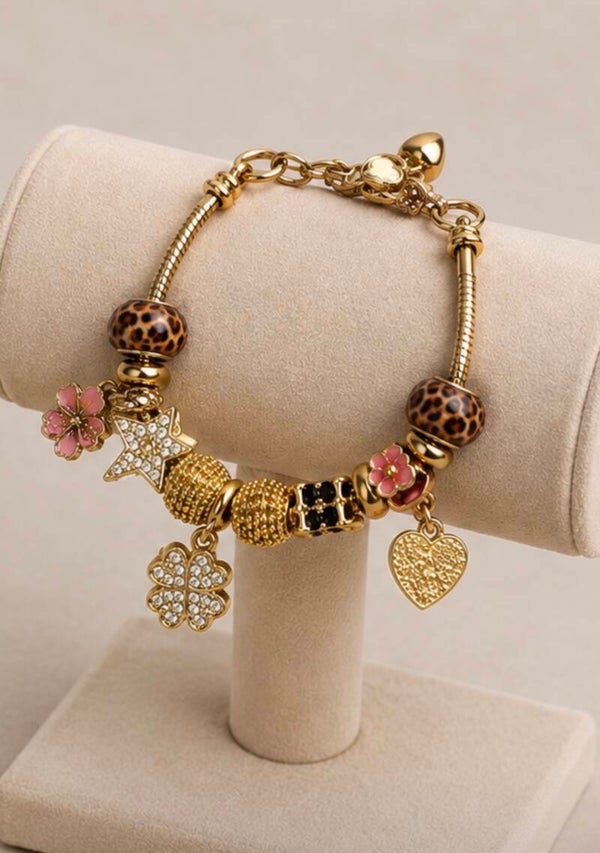 Elegant Gold and Pink Charm Bracelet