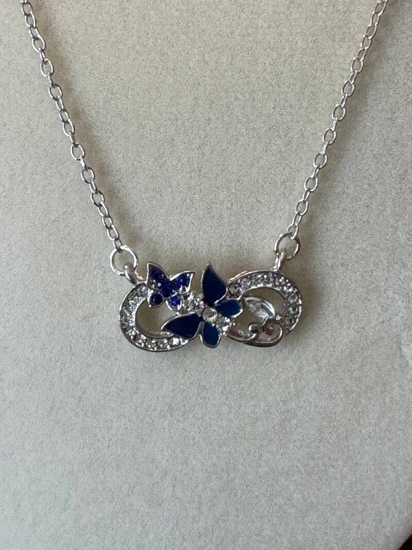 Elegant Sterling Silver and Blue Butterfly Necklace