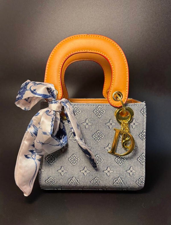 Chic Blue Mini Bag with Sleek Design and Compact Size