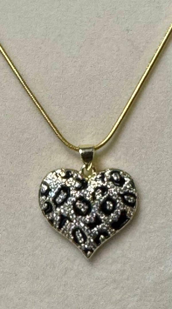 Gold and Silver Heart Pendant Necklace with Crystal Detailing