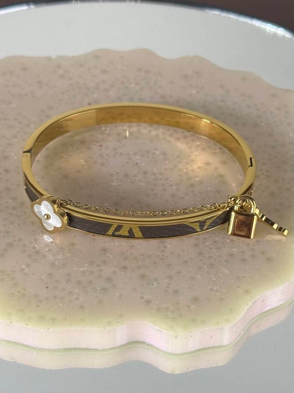 Gold and Brown Bracelet with White Flower Charm