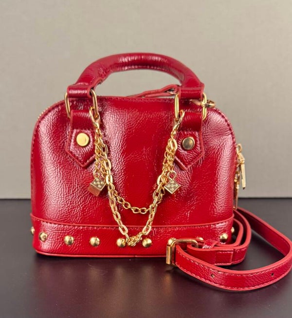 Red Designer Handbag with Gold Accents