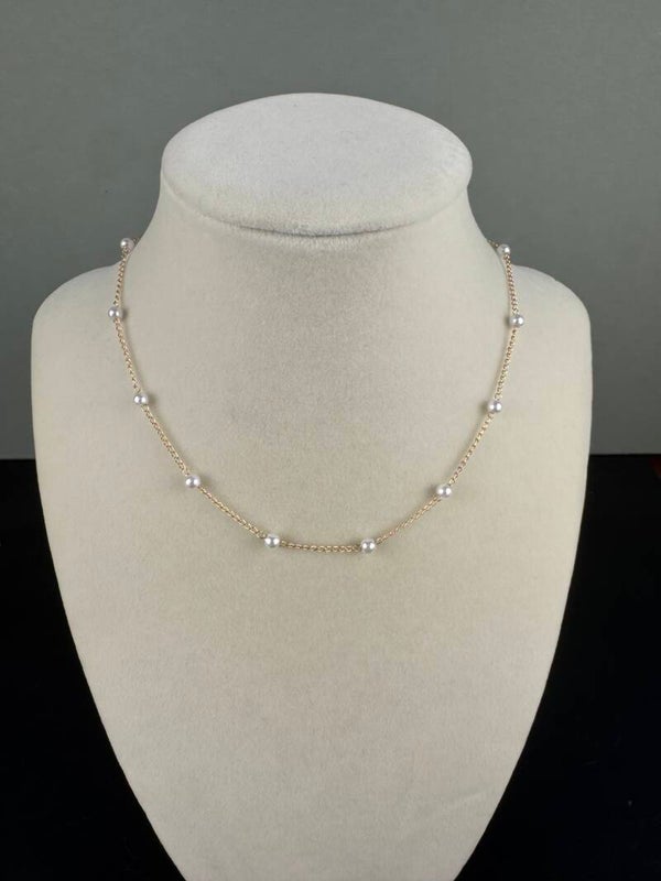 N- Elegant Gold and Pearl Necklace