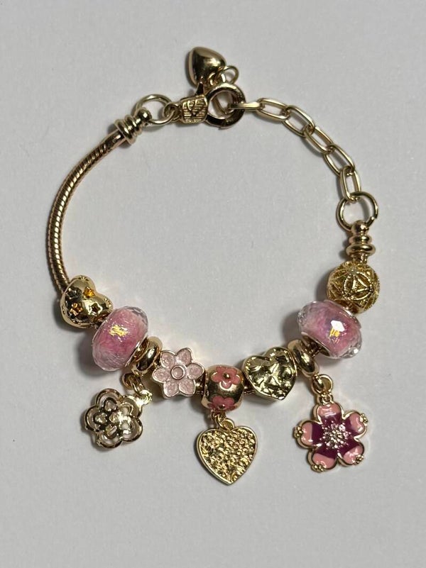 Gold and Pink Charm Bracelet