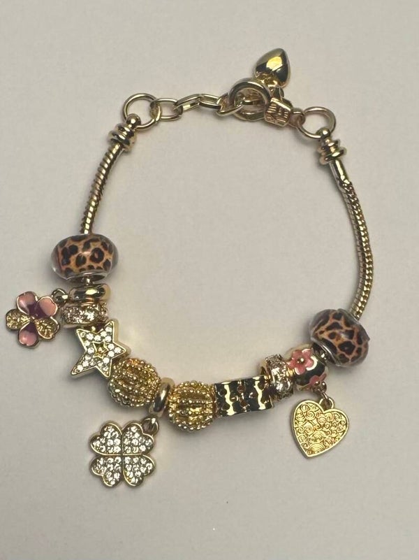 Elegant Gold and Pink Charm Bracelet