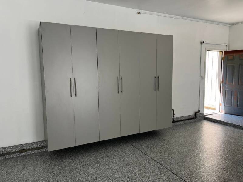 Big and Tall package: three tall gray cabinets on a garage wall