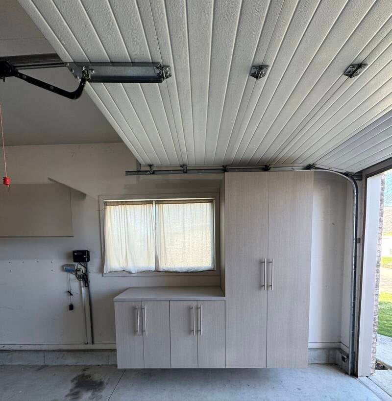 Starter package: tall gray cabinet with two short cabinets under a window