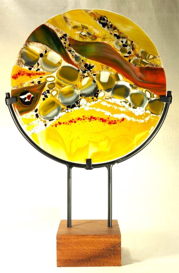 Fused glass standing sculpture of natural layers