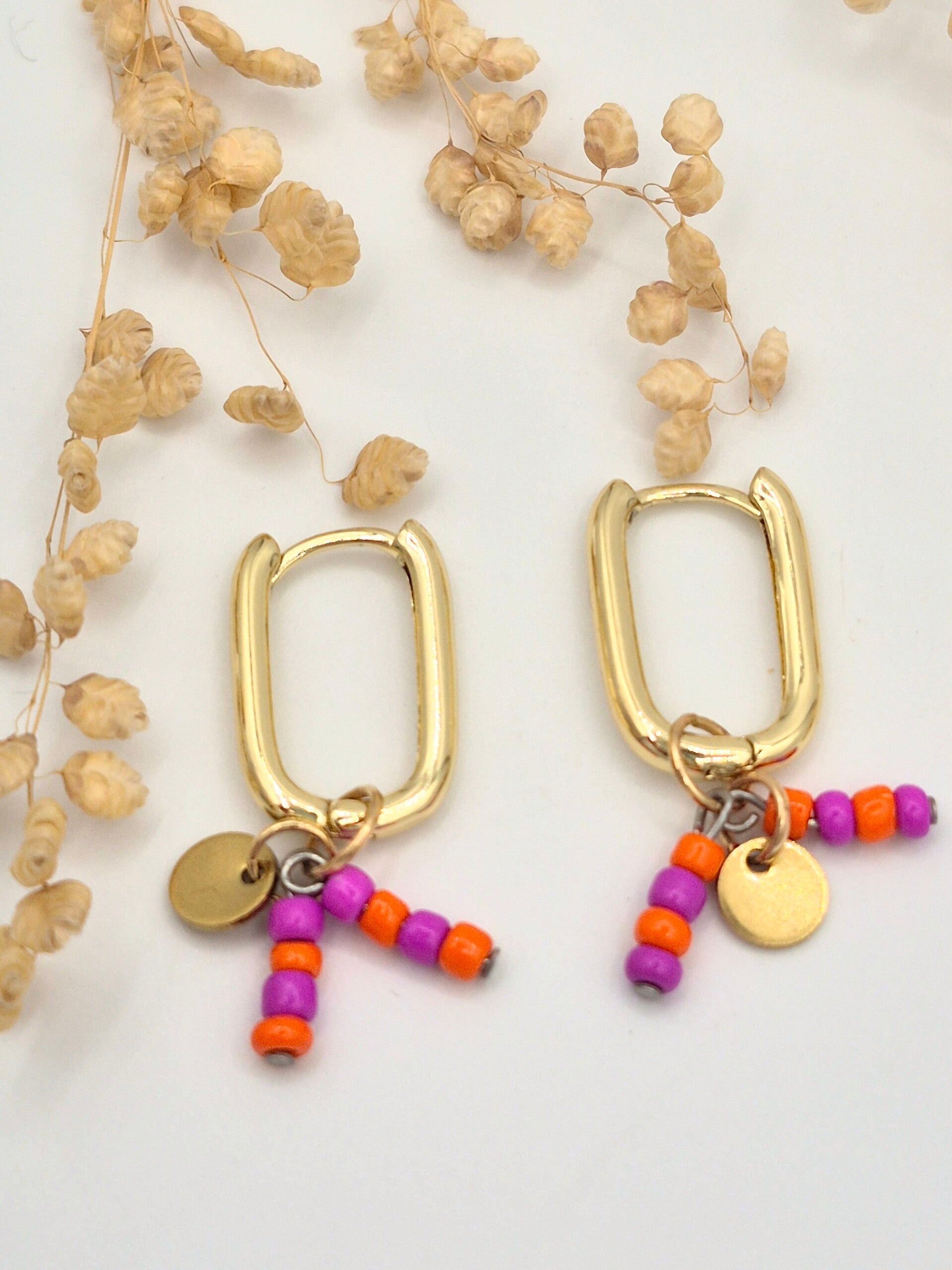 Oorringetjes met bedels | Fuchsia