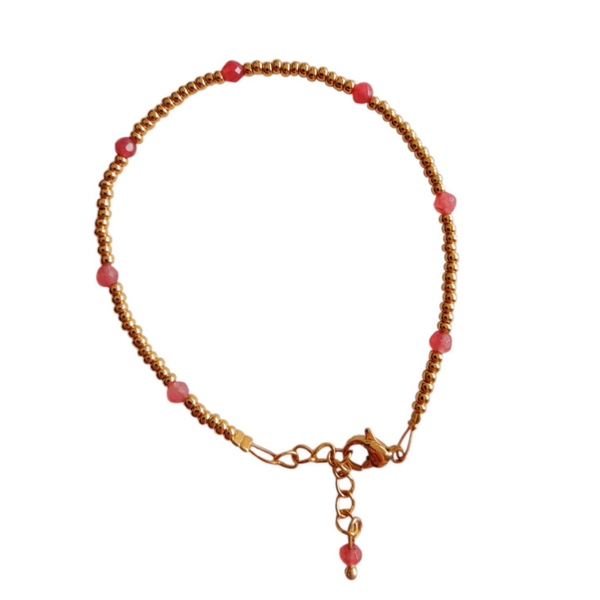 Armband goud met roze accenten