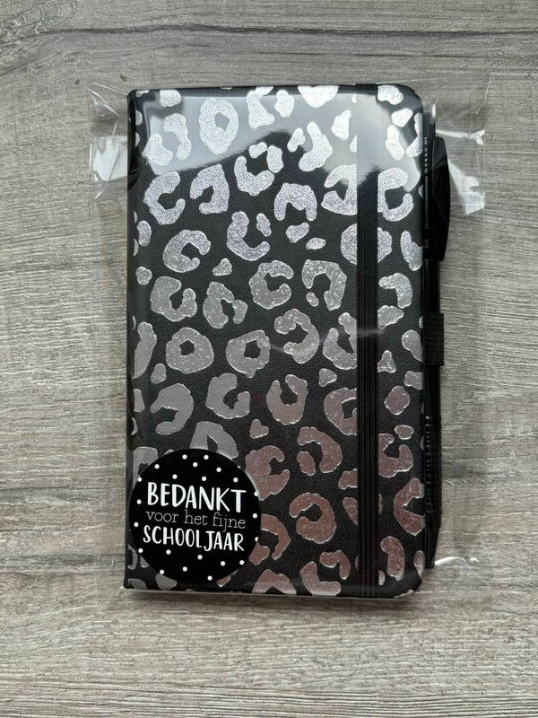 Notitie boekje met pen