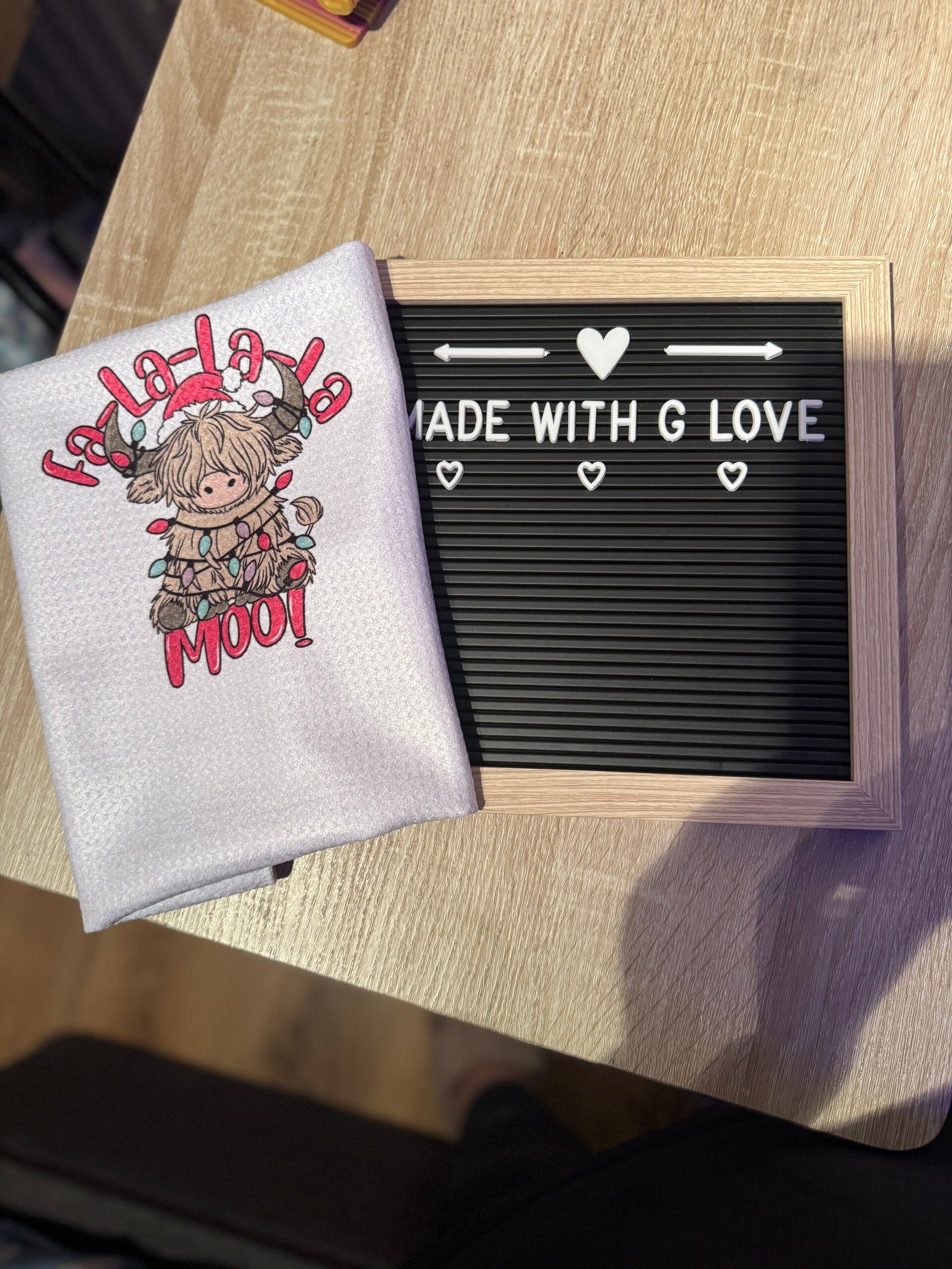 Fa-la-la-la Moo Teatowel