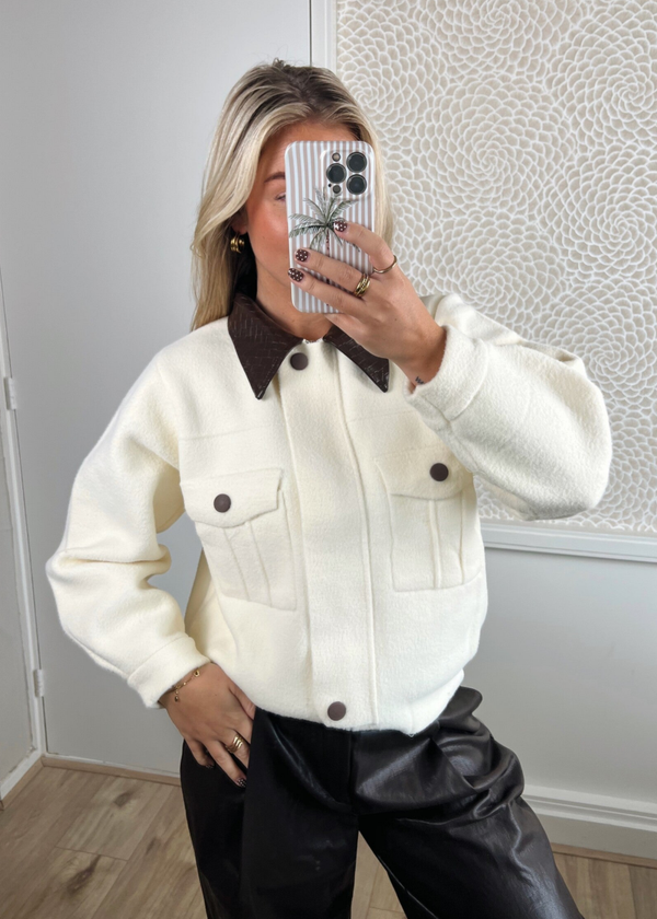 Vest crème kraag leer
