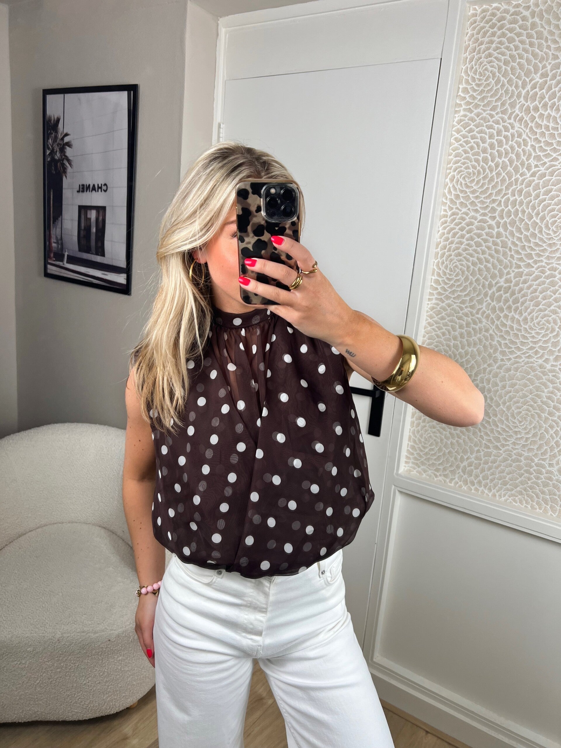 Blouse bruin wit mouwloos stip